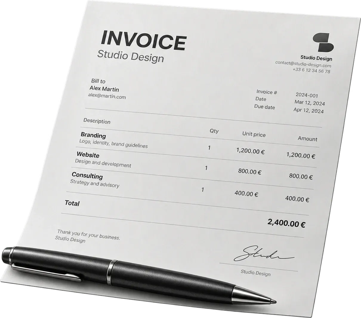 An invoice sheet with a black pen resting on it